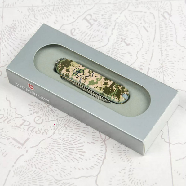 Ніж брелок Victorinox 58мм CLASSIC SD ARMY 2 шари 7 функцій Піксель (0.6223.3_W3940pw) Ніж брелок Victorinox 58мм CLASSIC SD ARMY 2 шари 7 функцій Піксель (0.6223.3_W3940pw)