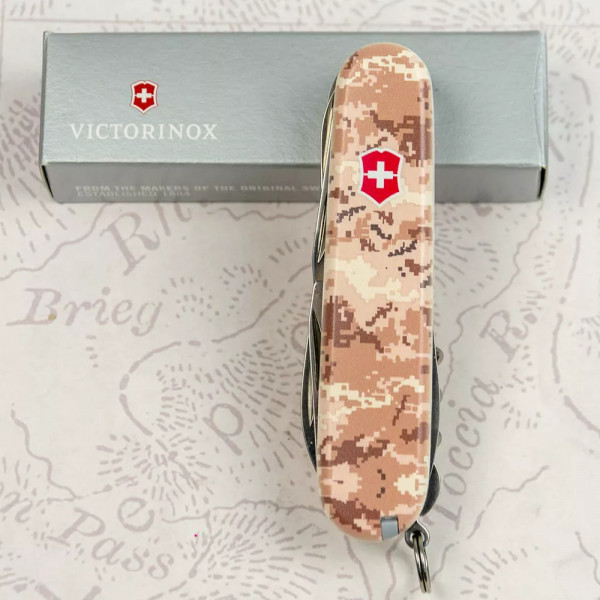 Багатофункціональний складаний ніж 91 мм Victorinox Huntsman Army 4 шари, 15 функцій Піксель пісочний з червоним лого (1.3713.7_W3945p) Багатофункціональний складаний ніж 91 мм Victorinox Huntsman Army 4 шари, 15 функцій Піксель пісочний з червоним лого (1.3713.7_W3945p)